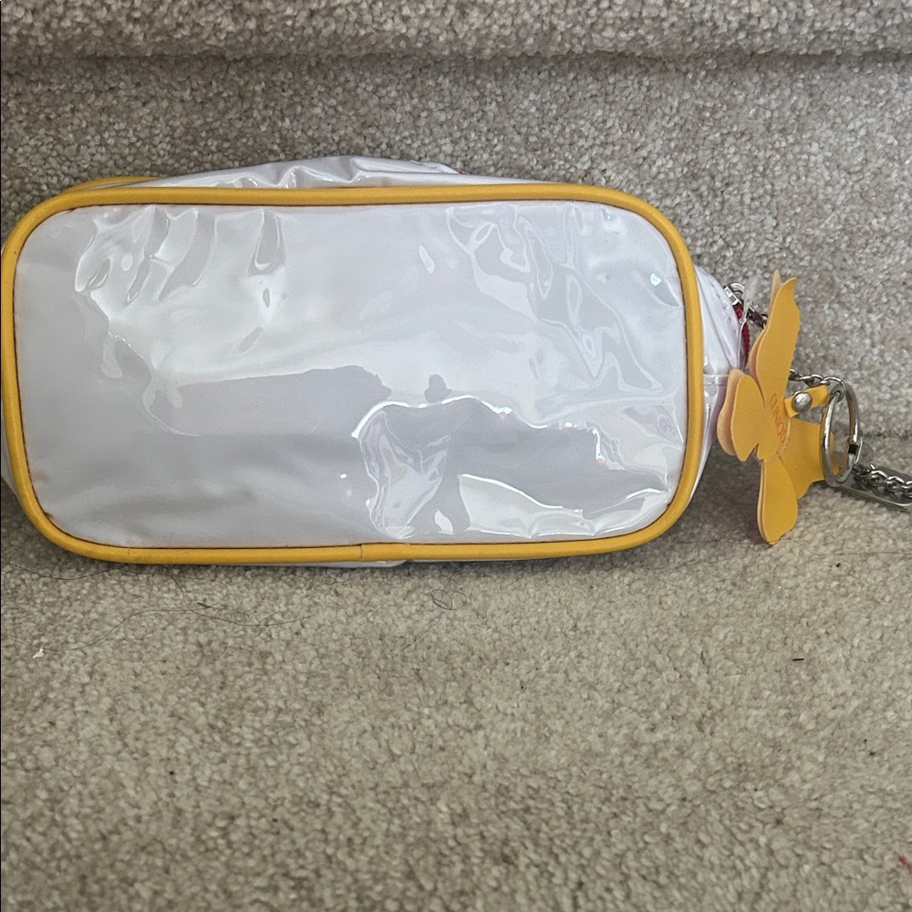 Clinique White Bag with Yellow Butterfly Charm